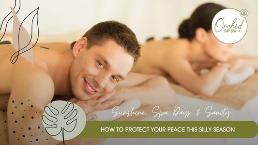 A smiling man receiving a relaxing couples massage at Orchid Day Spa, with a partner in the background — a tranquil moment from couples spa packages South Africa.