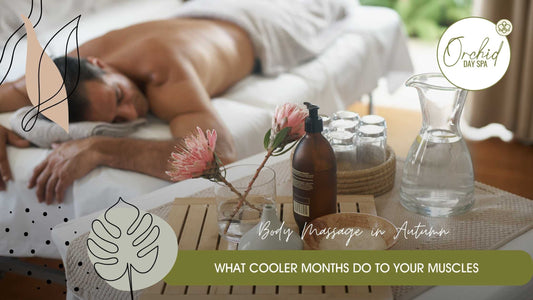 Man receiving a soothing Body Massage at Orchid Day Spa Knysna with tranquil autumn-inspired spa setting